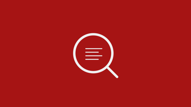 Banner des Essential SEO WordPress Plugins – rotes Design mit zentriertem Lupensymbol.